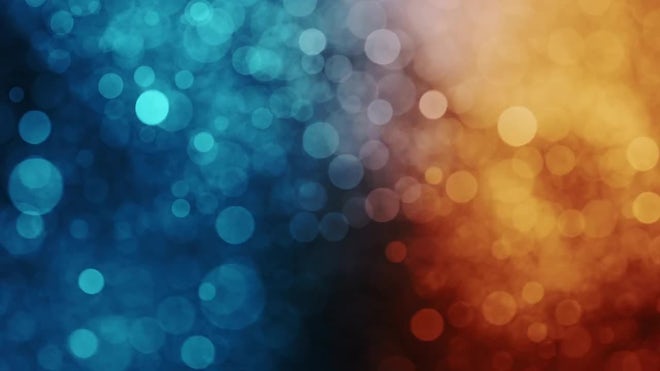 Circular Bokeh Particles With Blue And Orange Tones
